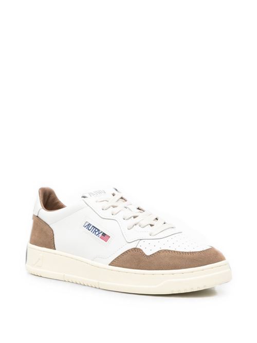 Sneakers uomo Autry Medalist beige e bianche in pelle e camoscio AUTRY | AULMFT17