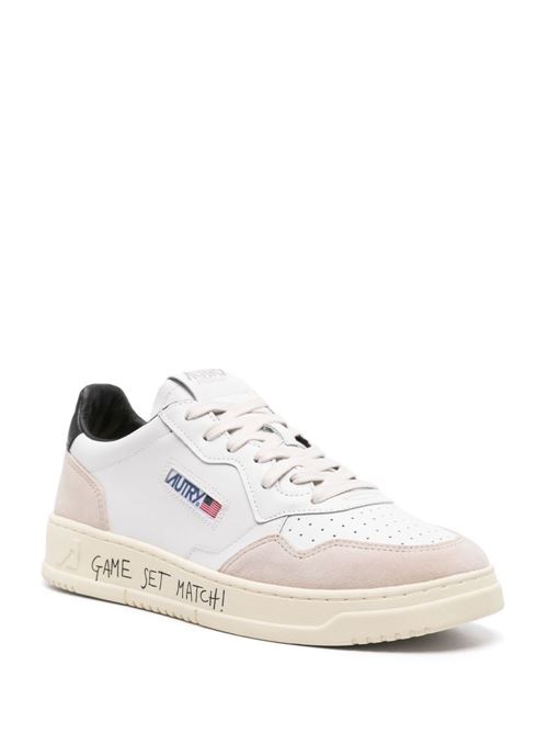 Sneakers uomo Autry Medalist bianche e nere in pelle e camoscio AUTRY | AULMMA04