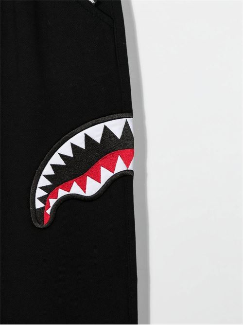 Pantalone bambino in felpa con disegno denti squalo su un lato Sprayground | SPY290BLK